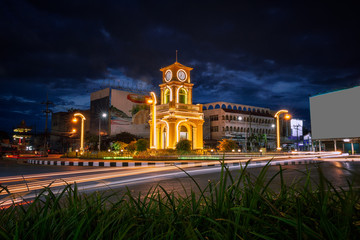 Fototapeta na wymiar Clock Tower or Surin Circle on sunset in Phuket Town , Thailnad.