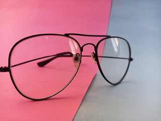 glasses on a pink and blue table design