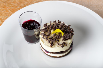 Panna cotta mini cake with berry topping. Panna cotta is an Italian dessert