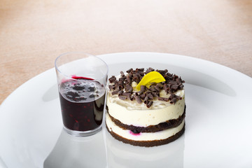Panna cotta mini cake with berry topping. Panna cotta is an Italian dessert