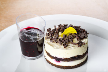 Panna cotta mini cake with berry topping. Panna cotta is an Italian dessert