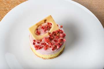 Duo cheese cake with strawberries. Cheesecake is a sweet dessert consisting of one or more layers