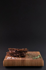 Close-up of a piece of meat on a wooden Board with spices. Restaurant menu, a series of photos of different dishes