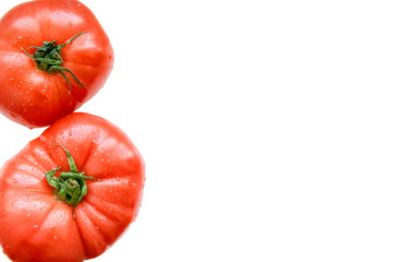 Red tomatoes on a white isolated background