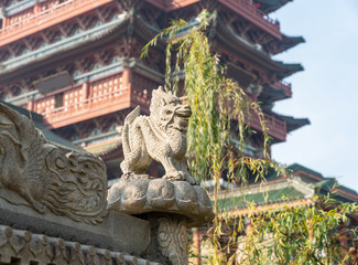 Kirin stone carving on the eaves