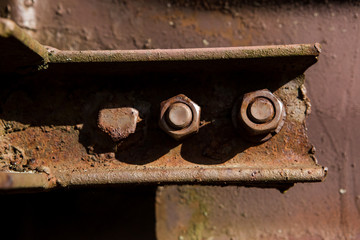 Old rusty metal door handle, old rusty bolts
