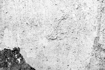 Texture of a concrete wall with cracks and scratches which can be used as a background