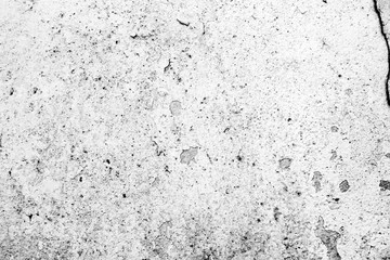 Texture of a concrete wall with cracks and scratches which can be used as a background