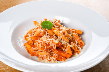 Italian spicy penne arrabiata or pasta al'arrabiata. Arrabbiata sauce is a spicy sauce for pasta
