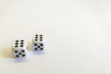 Dice in white with black dots with a successful combination isolated on a white background. Great space for text. Good luck in the game. Victory concept. Gambling concept