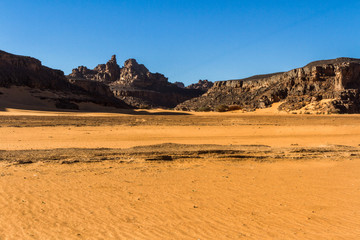 Sahara desert landscape.  Sand and amazing sandstone mountain  at  Tassili nAjjer National Park,...