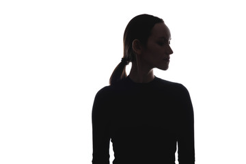 black and white silhouette portrait of woman head turned sideways