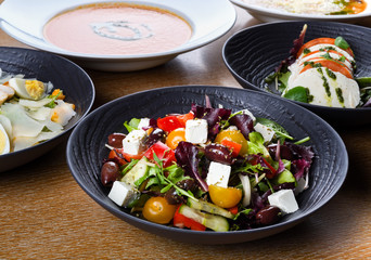Greek salad or horiatiki salad is a salad in Greek cuisine. Greek salad is made with tomatoes