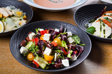 Greek salad or horiatiki salad is a salad in Greek cuisine. Greek salad is made with tomatoes