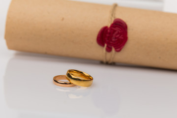 Couple with divorce contract and ring on desk. Divorce.