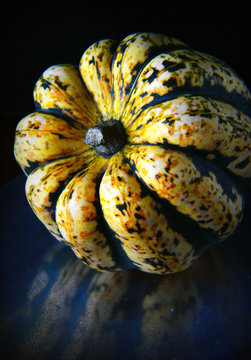 Close-up Of Sweet Dumpling Squash On Table