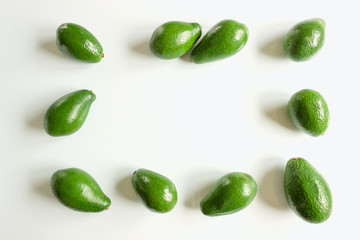 Ripe avocado fruits on a white background. Concept of healthy eating, vegetarianism.