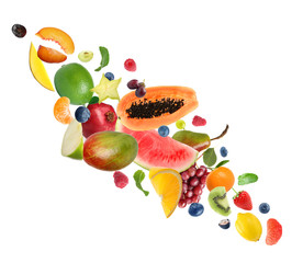 Set of different fresh fruits and berries on white background