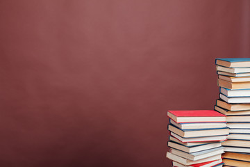 many stacks of educational books to prepare for exams in the university library