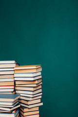 many stacks of educational books to prepare for exams in the university library