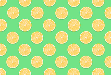 Pattern of lemon slices on light green background