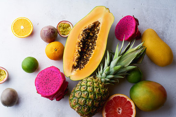 Flat lay with variety of fresh tropical fruits