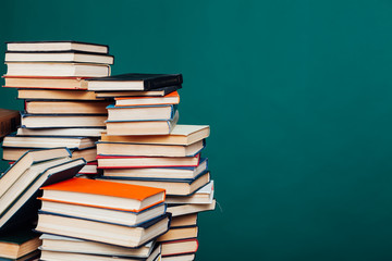 many stacks of educational books to prepare for exams in the university library