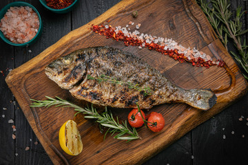 Grilled Dorada fish, sea bream with the addition of spices