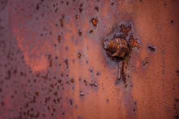 old rusty metal background, rusty bolt