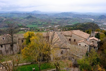 Fototapeta na wymiar View over San Marino architecture and landscape in autumn
