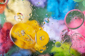 Abstract colorful background. Oil and water drops. Rainbow blurred texture