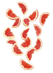 Slices of juicy grapefruit on white background