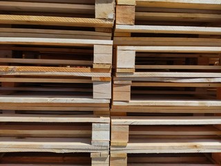 Stacked wooden pallets as background texture or backdrop
