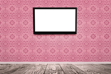 Modern TV on pink wall in room. Space for design