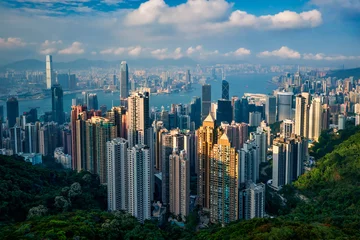 Foto op Plexiglas Hal Beroemde weergave van Hong Kong - Hong Kong wolkenkrabbers skyline stadsgezicht uitzicht vanaf Victoria Peak op zonsondergang. Hongkong, China