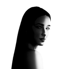 Fototapeta premium High contrast black and white portrait of beautiful young woman