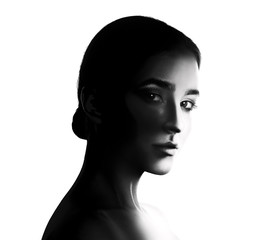 High contrast black and white portrait of beautiful young woman