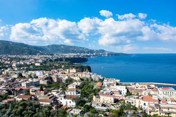 Fototapeta na wymiar View overlooking the bay and the beautiful town of Piano di Sorrento, Italy