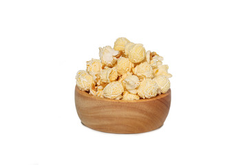 Popcorn is made from corn kernels on a white background.
