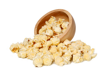 Popcorn is made from corn kernels on a white background.