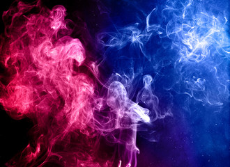 red and blue colorful smoke on dark background