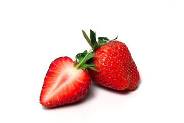 Strawberries are arranged in different styles on a white background.