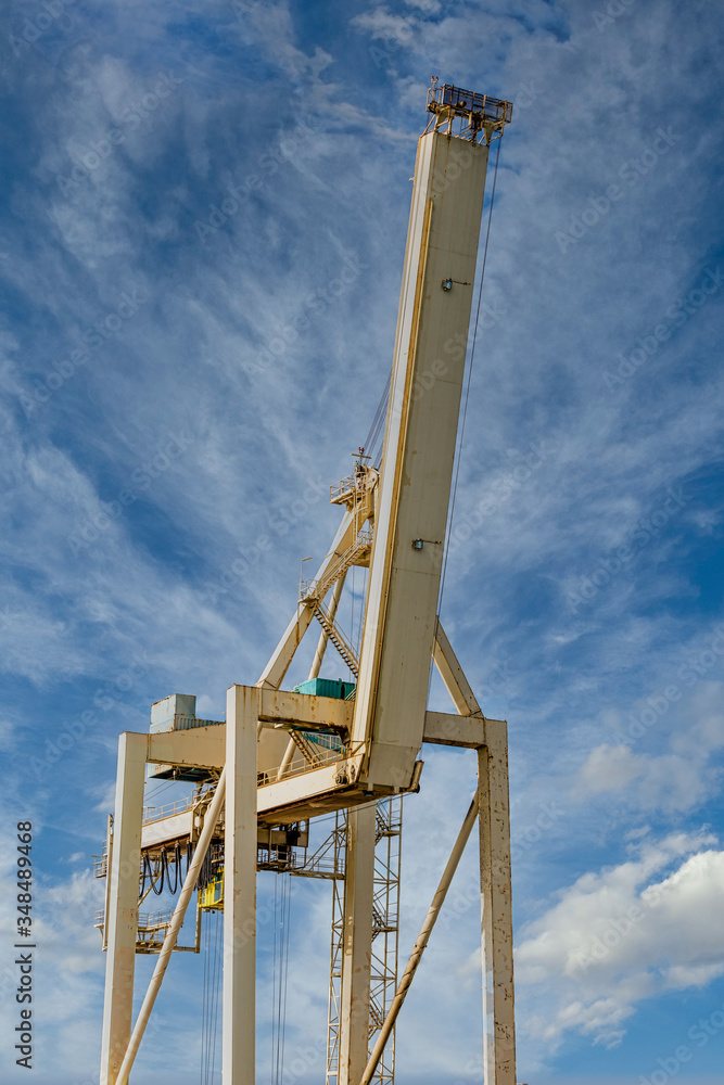 Canvas Prints Yellow Loading Crane against sky