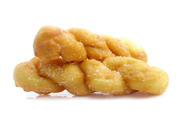 twisted bread donuts with sugar isolated on white