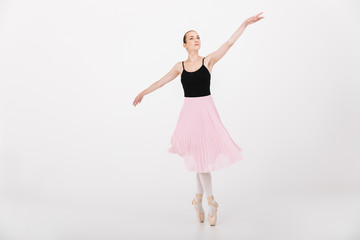 Fototapeta na wymiar Image of caucasian woman ballerina practicing and dancing gracefully