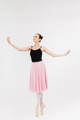 Naklejka premium Image of caucasian woman ballerina practicing and dancing gracefully