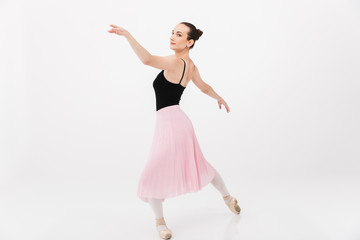 Image of caucasian woman ballerina practicing and dancing gracefully