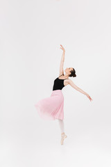 Naklejka na ściany i meble Image of caucasian woman ballerina practicing and dancing gracefully