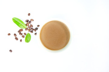 Hot coffee in a white mug and black coffee beans on a white background