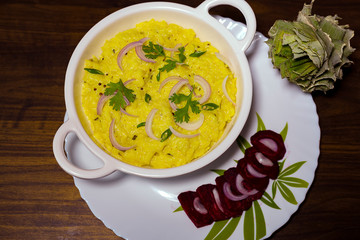 Indian healthy yellow curd rice with salad 